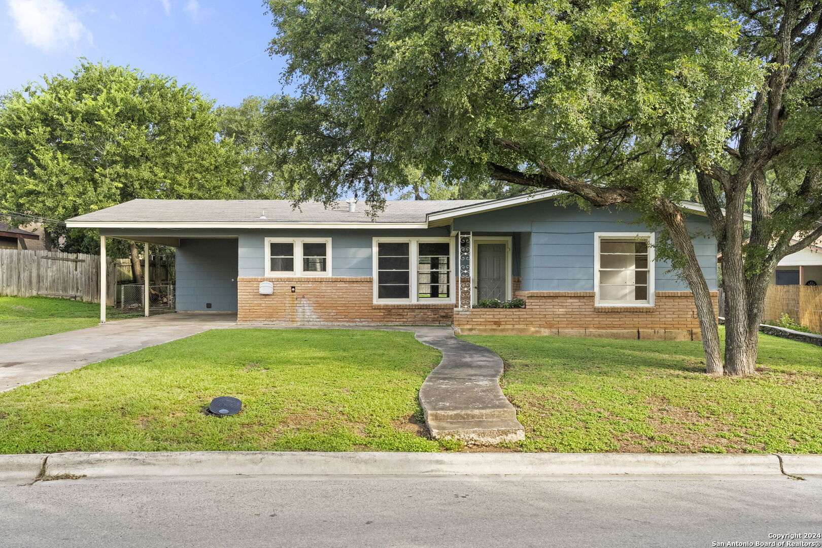 front view of a house and a yard