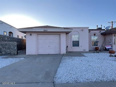 a view of a house with a garage