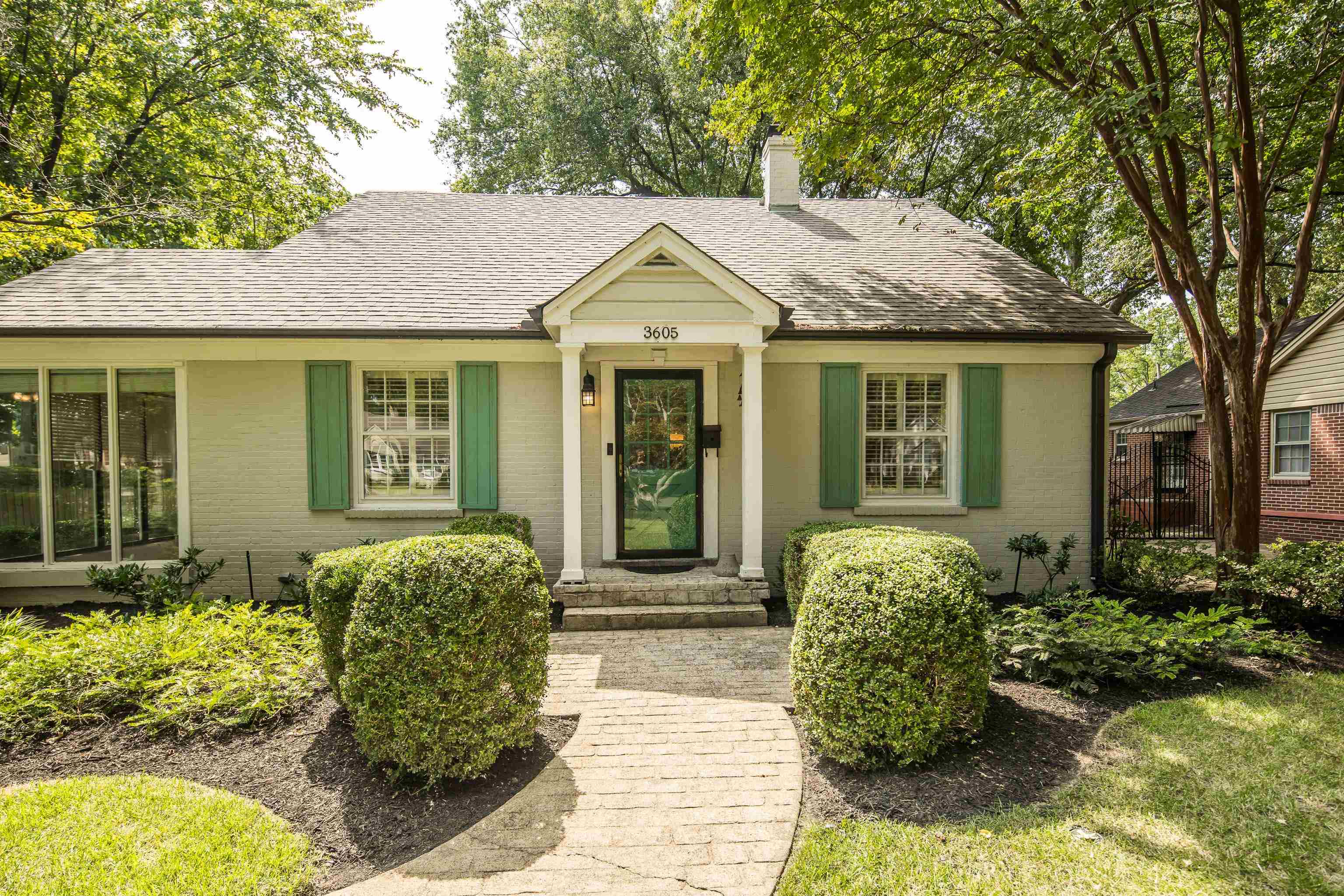 a view of a house with garden