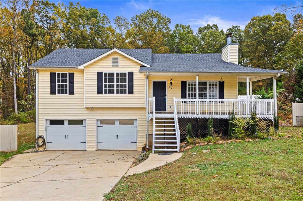 a front view of a house with yard