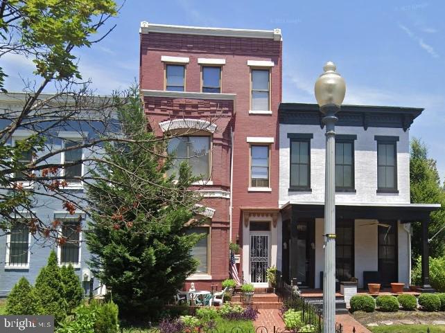 a front view of a multi story residential apartment building