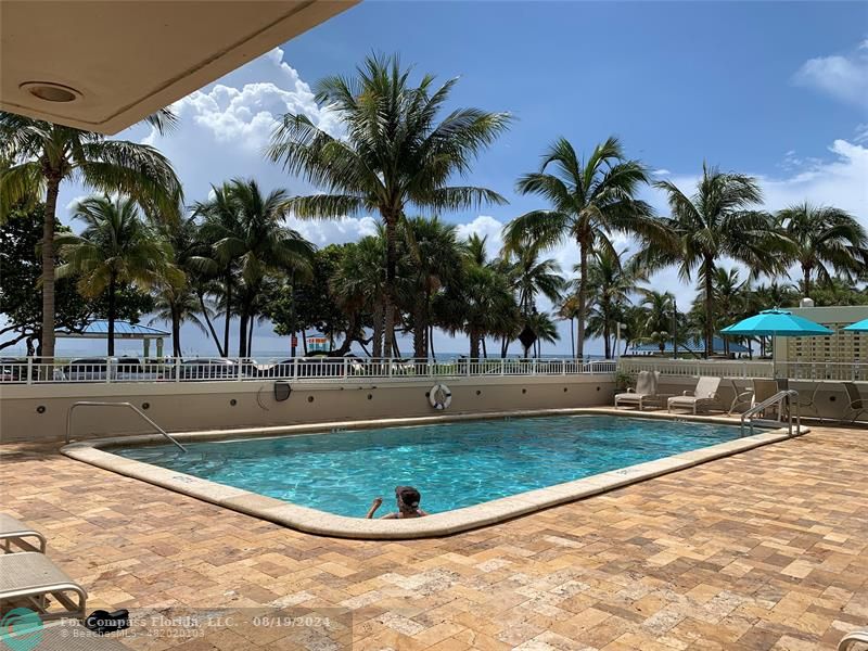 a view of outdoor space with swimming pool