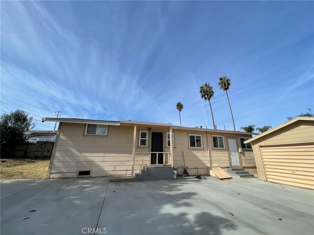 a front view of a house with a garage