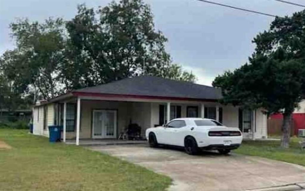 a car parked in front of a house