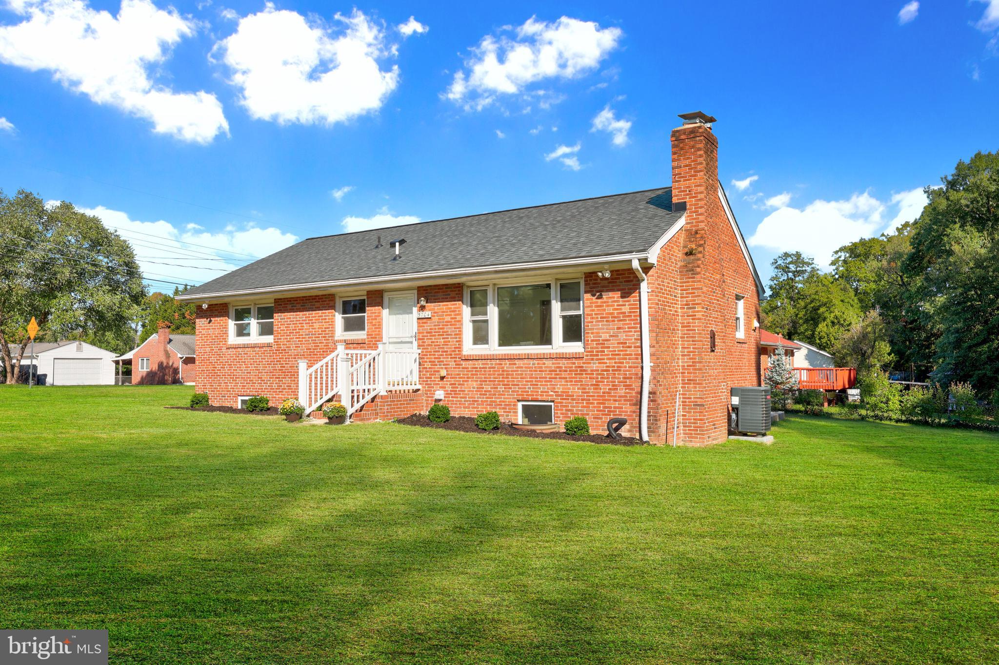 a front view of house with yard