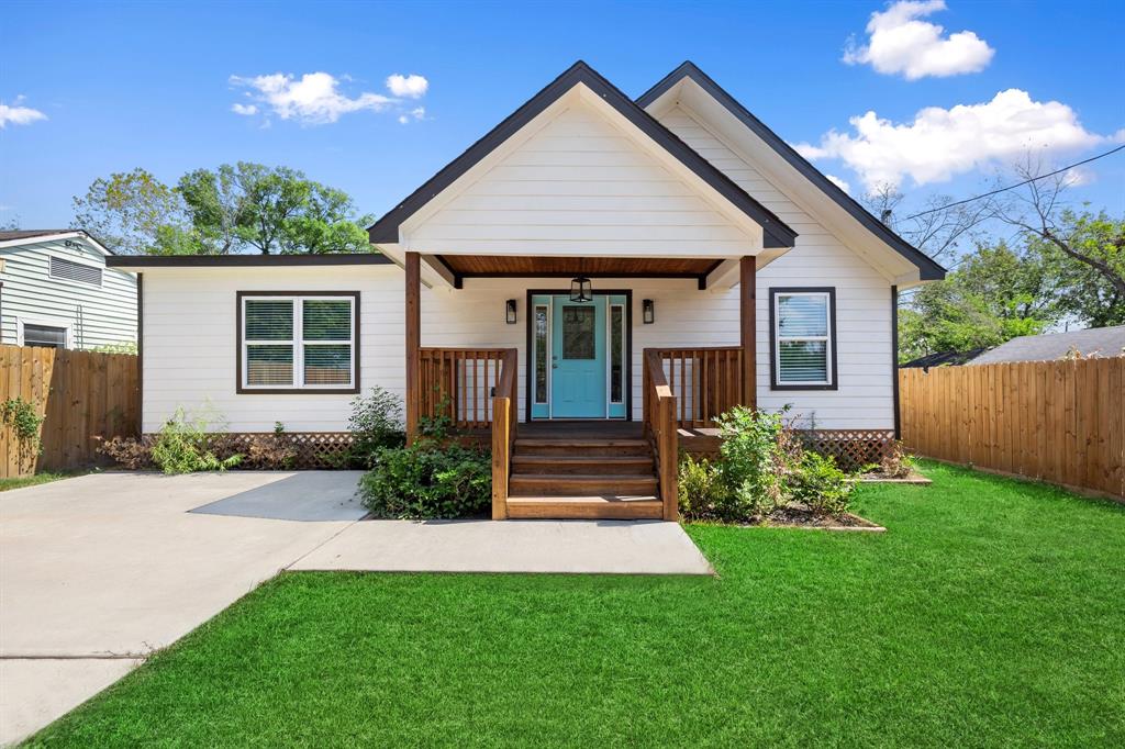 front view of a house with a yard