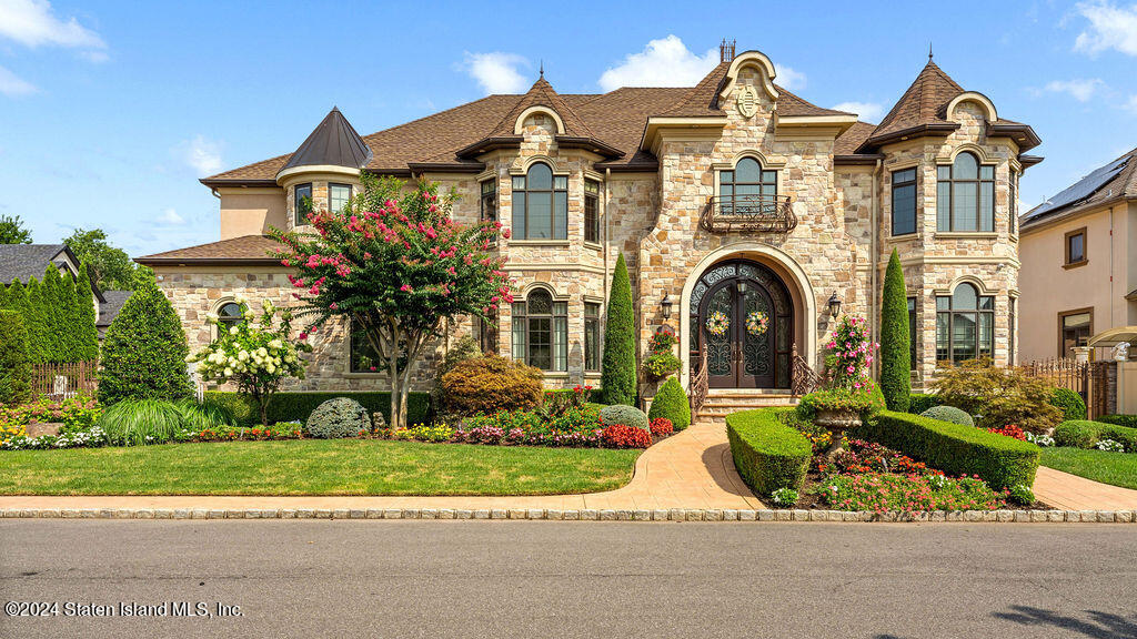 front view of a house with a small yard