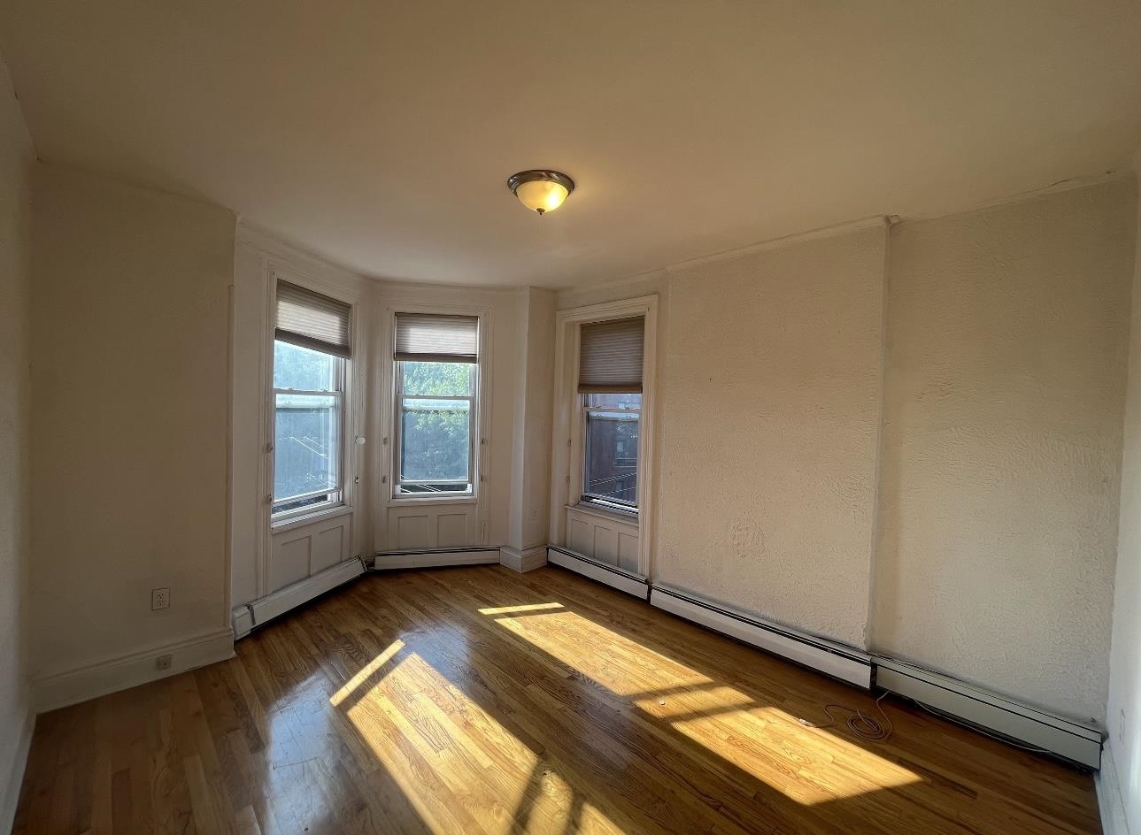 an empty room with windows