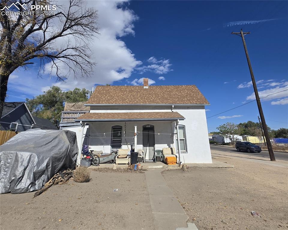 a view of car parked in front of house