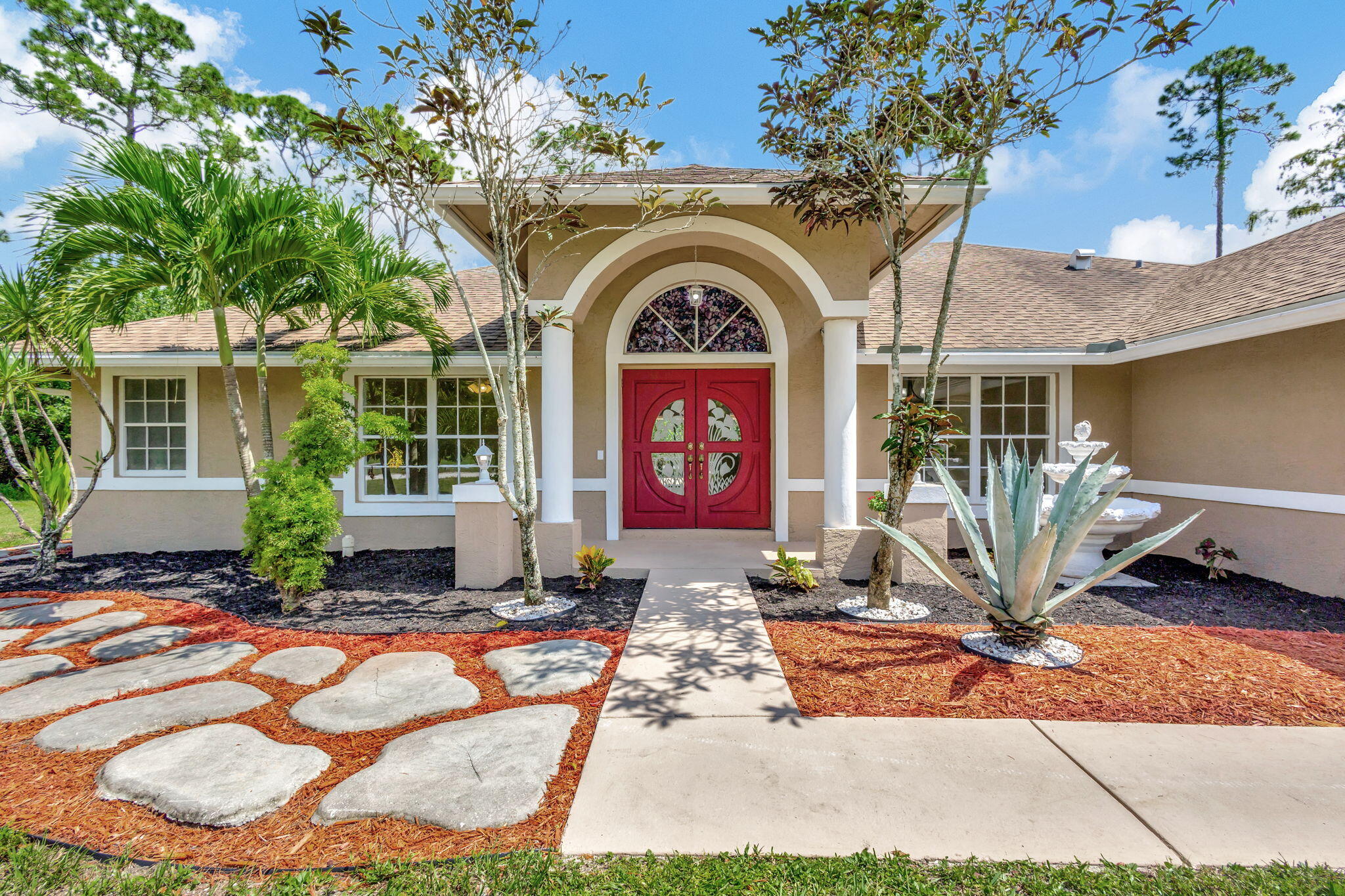 a view of a house with entertaining space