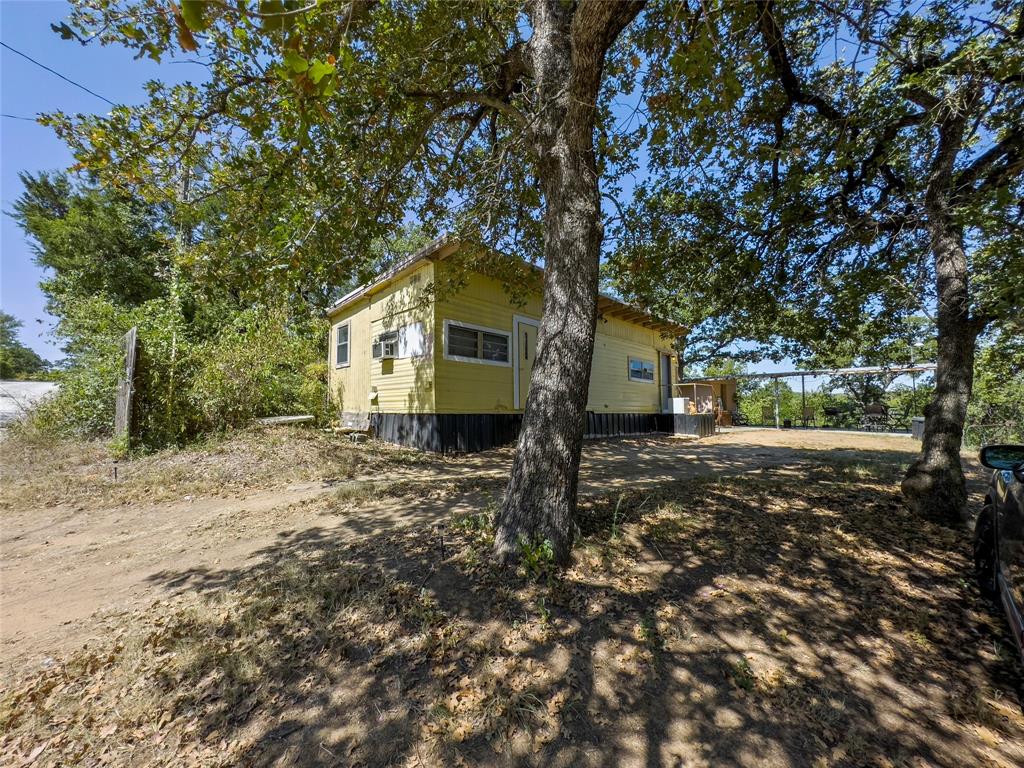 a house with trees in front of it