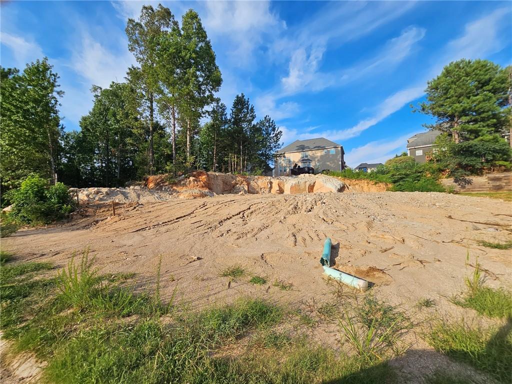 a view of a backyard of the house