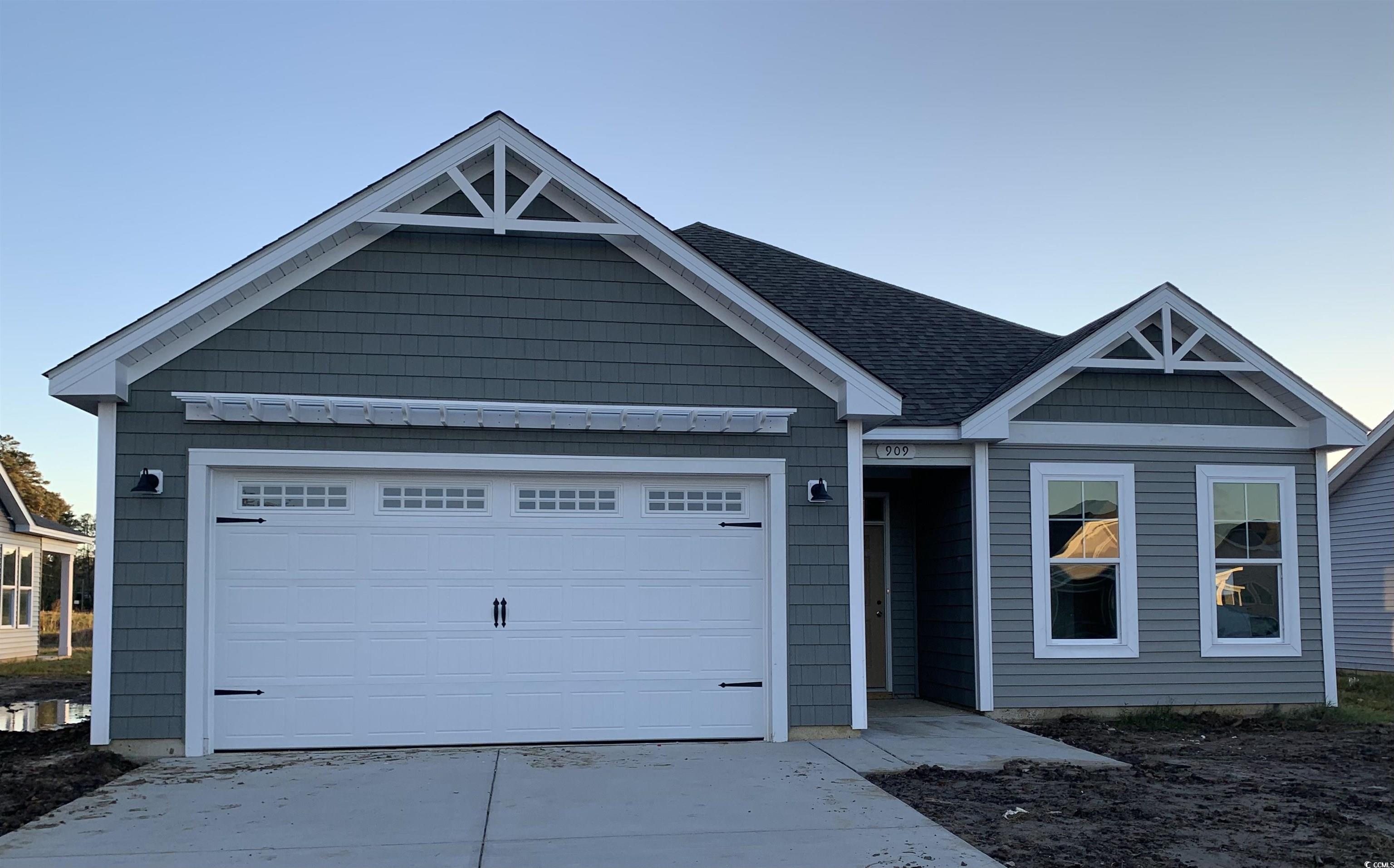 View of front of house featuring a garage