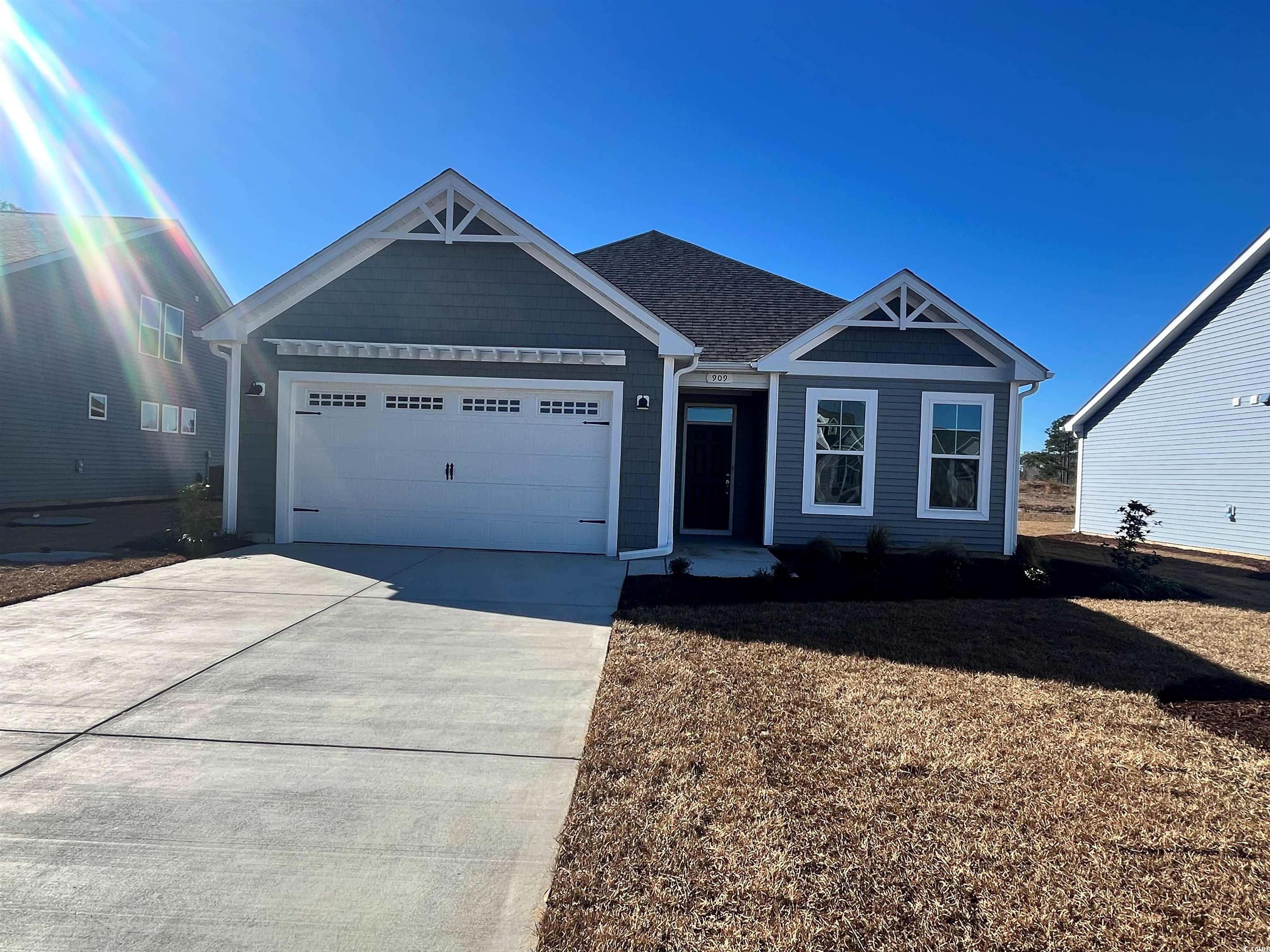 View of front of house with a garage