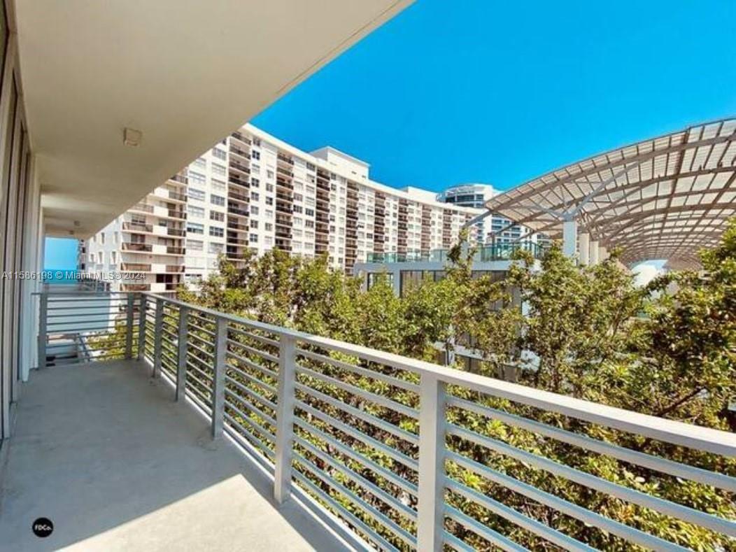 a view of a building from a balcony