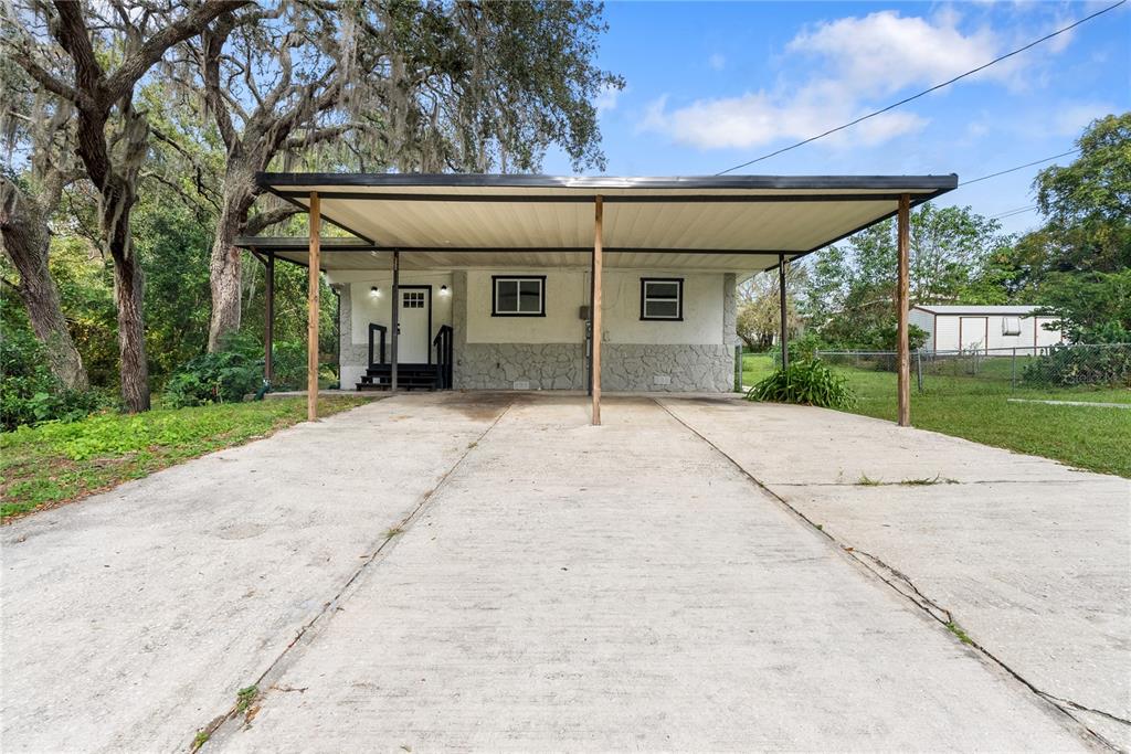 front view of a house with a small yard