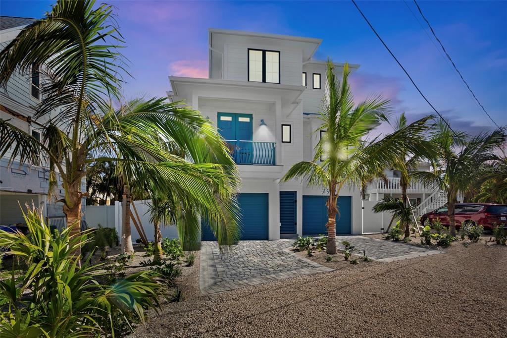 a view of a house with a street