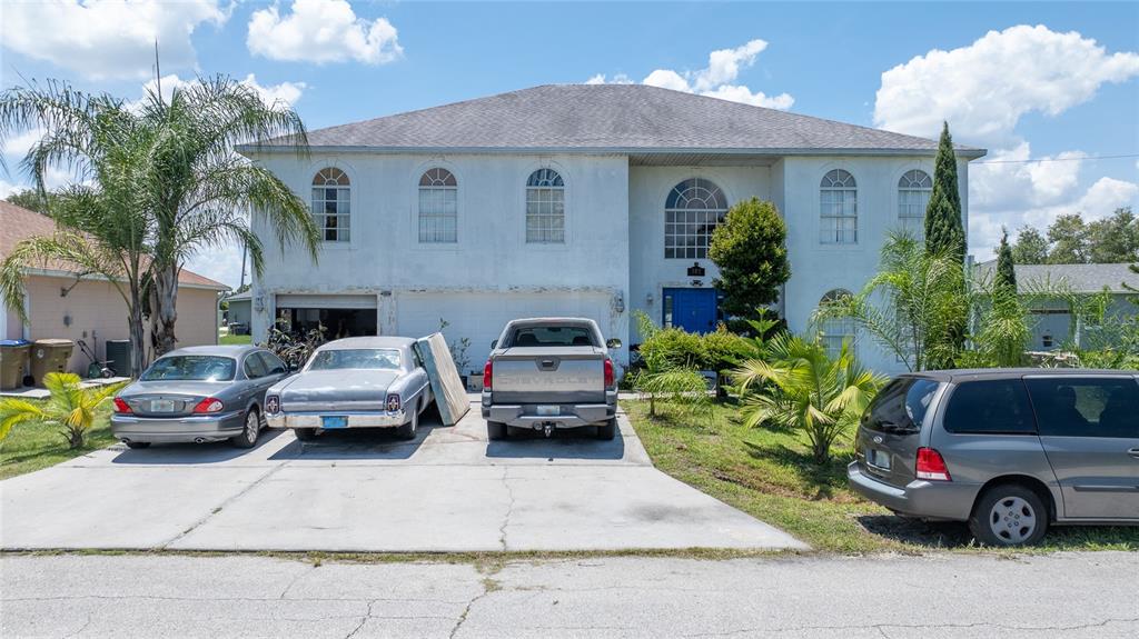 a car parked in front of a house