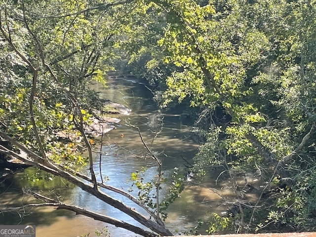 a view of a lake from a balcony