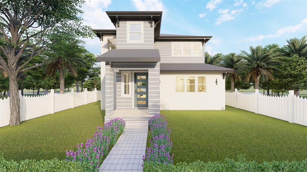 a front view of a house with a yard and potted plants