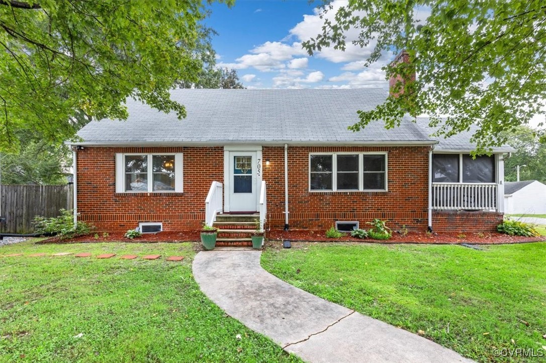 a front view of house with yard