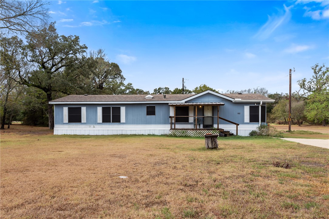 View of front of house featuring a front lawn