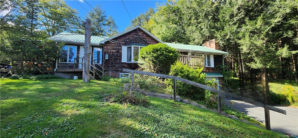 View of front of house with a front lawn