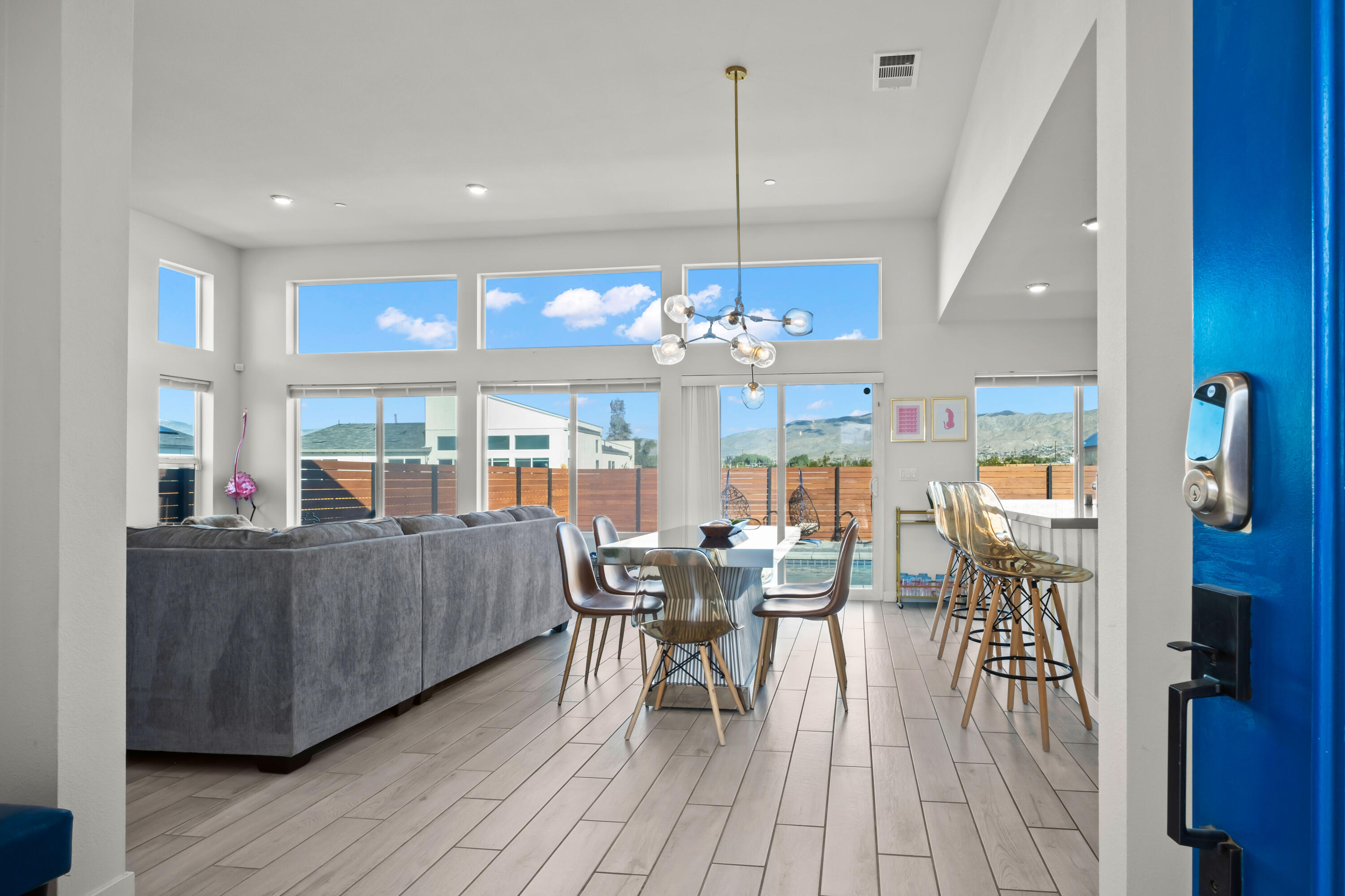 a view of a dining room with furniture window and wooden floor