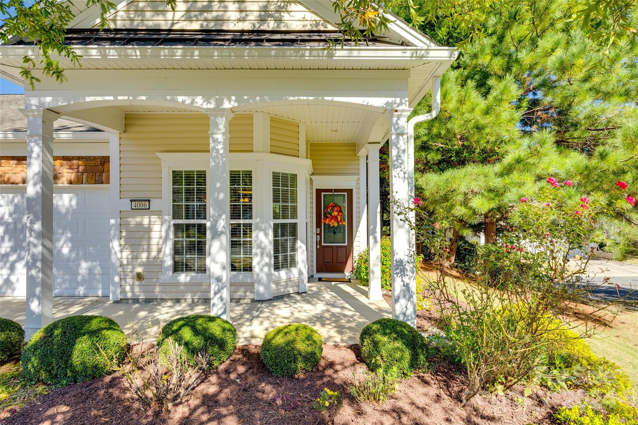 a front view of a house with a porch