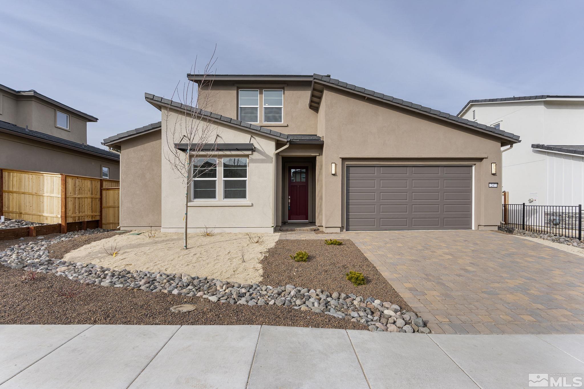 a front view of a house with a patio