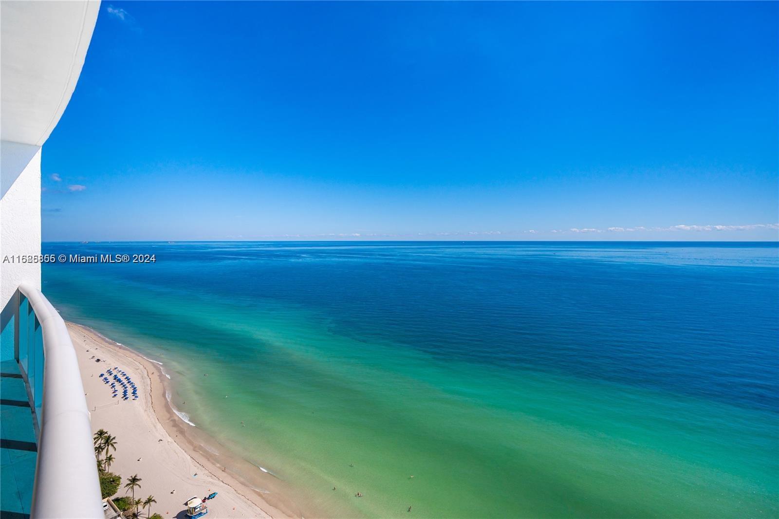 a view of an ocean from a balcony