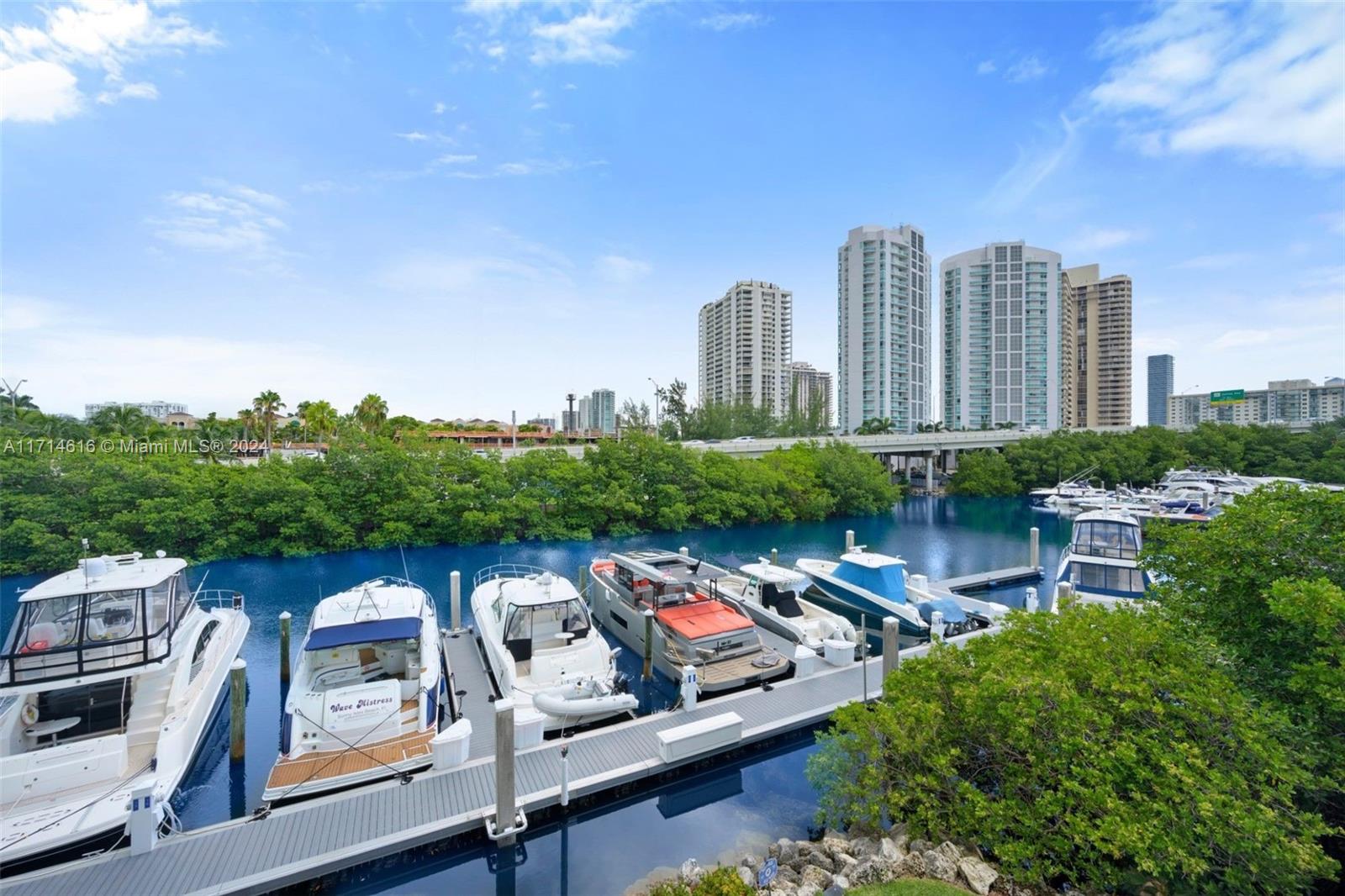 a view of a city with tall buildings