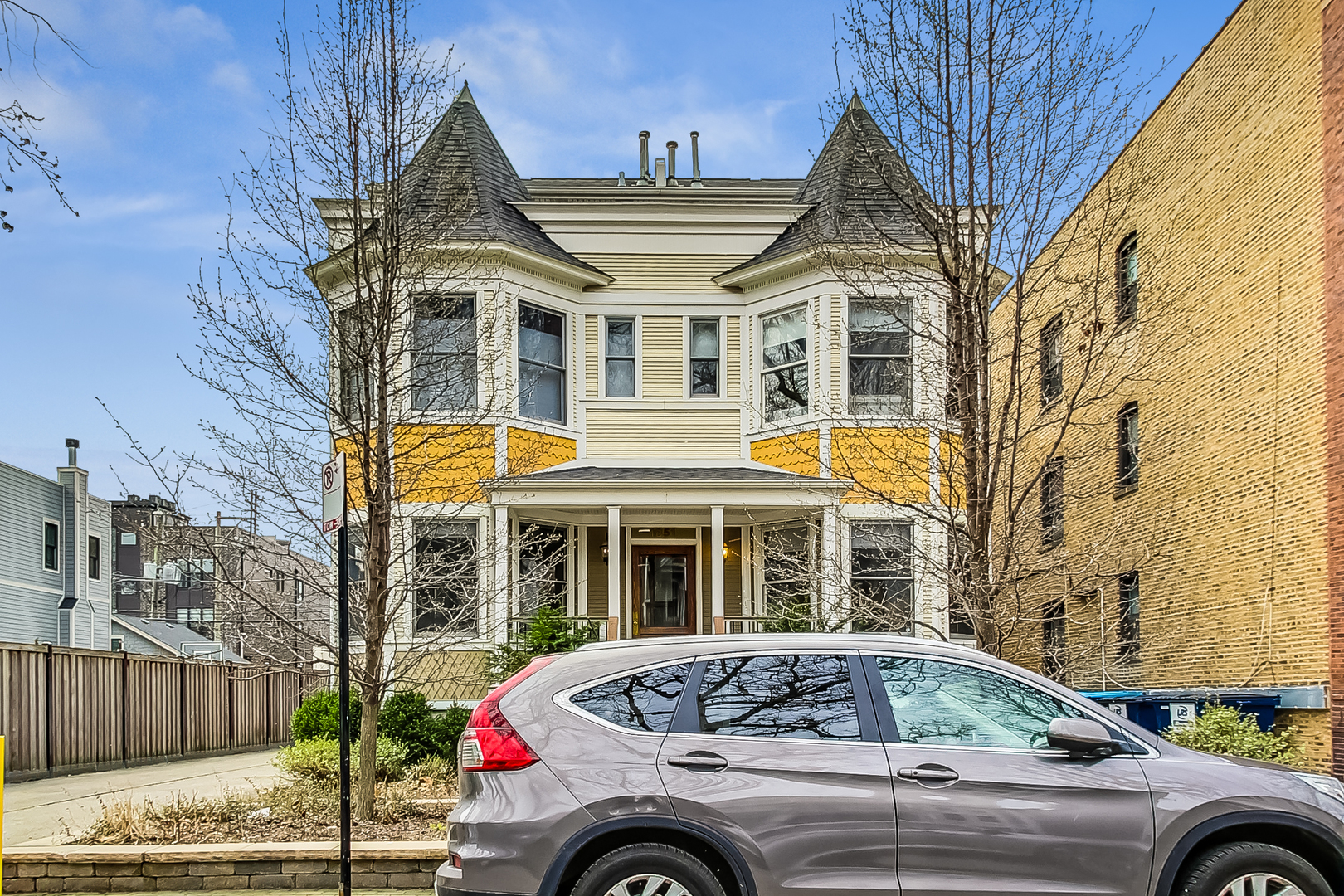 a front view of a house with parking space