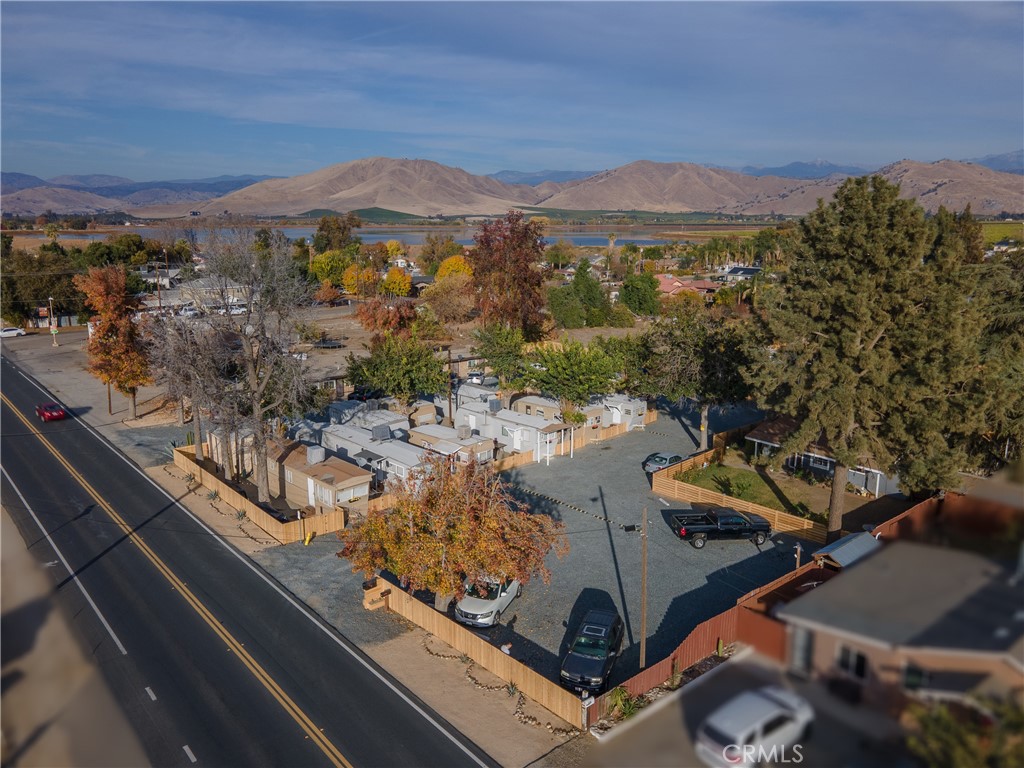 a view of a city with lawn chairs