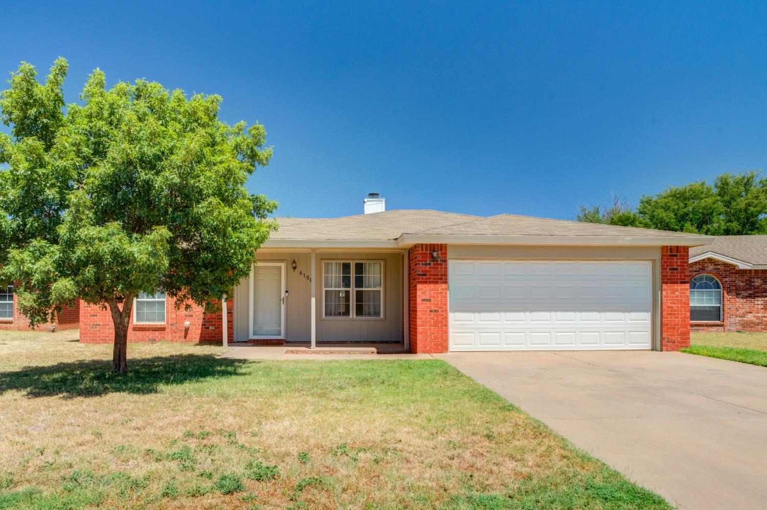 a front view of house with yard