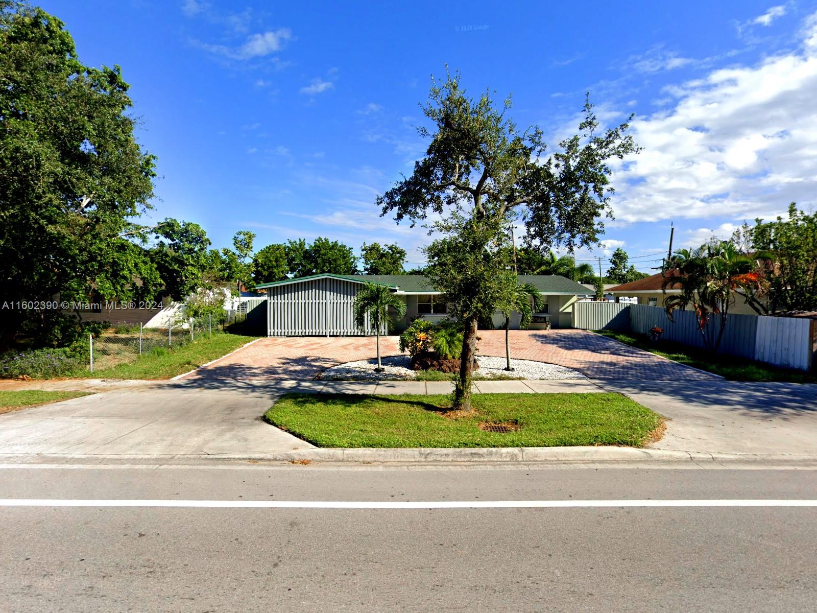 a view of a house with swimming pool