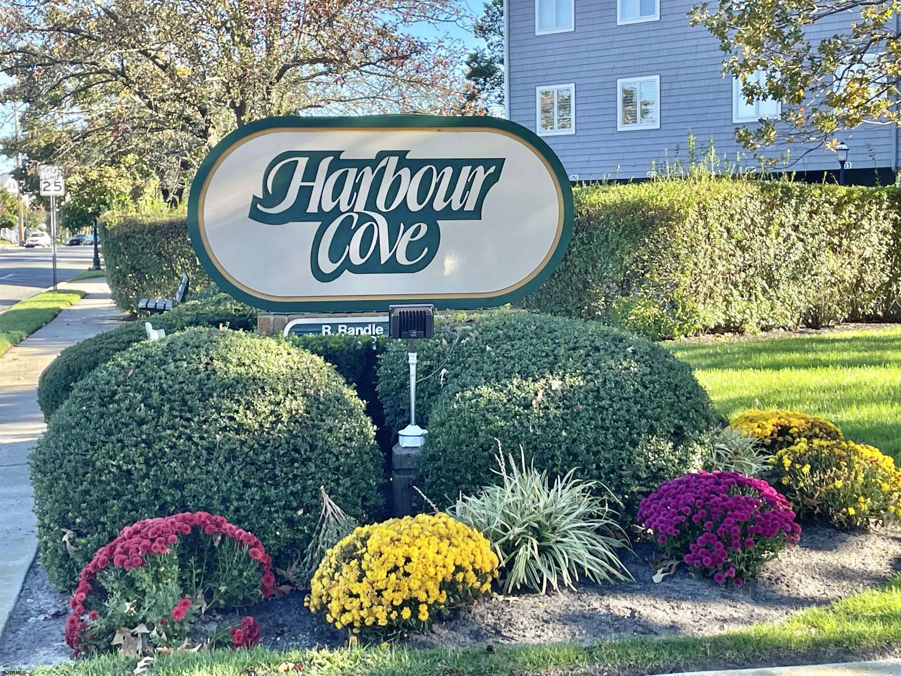 a sign that is sitting in front of a building