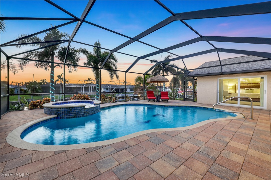 a view of a swimming pool with a porch