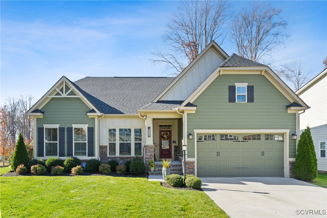 a front view of a house with garden