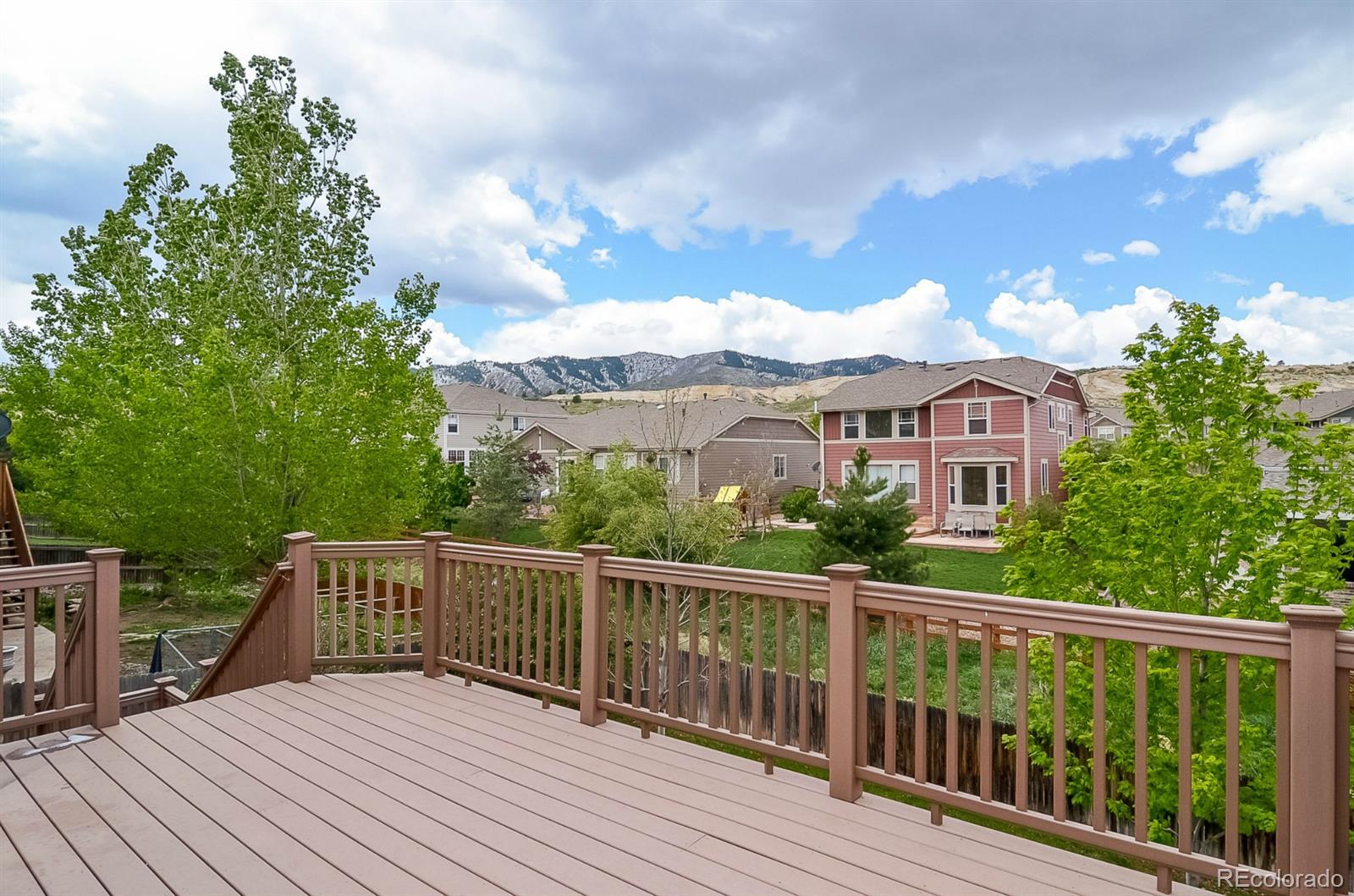 a view of a wooden roof deck