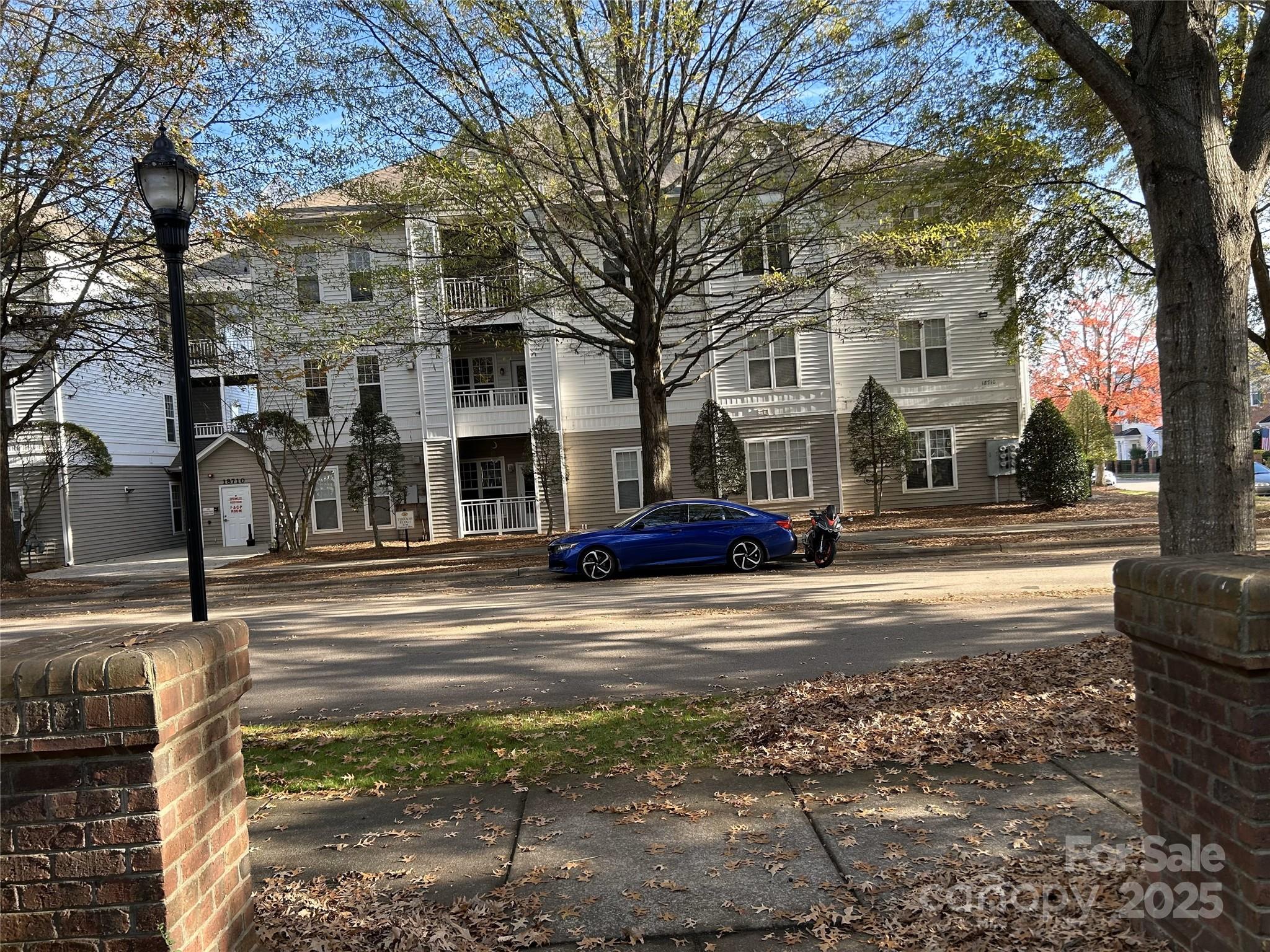 a view of a building with a street