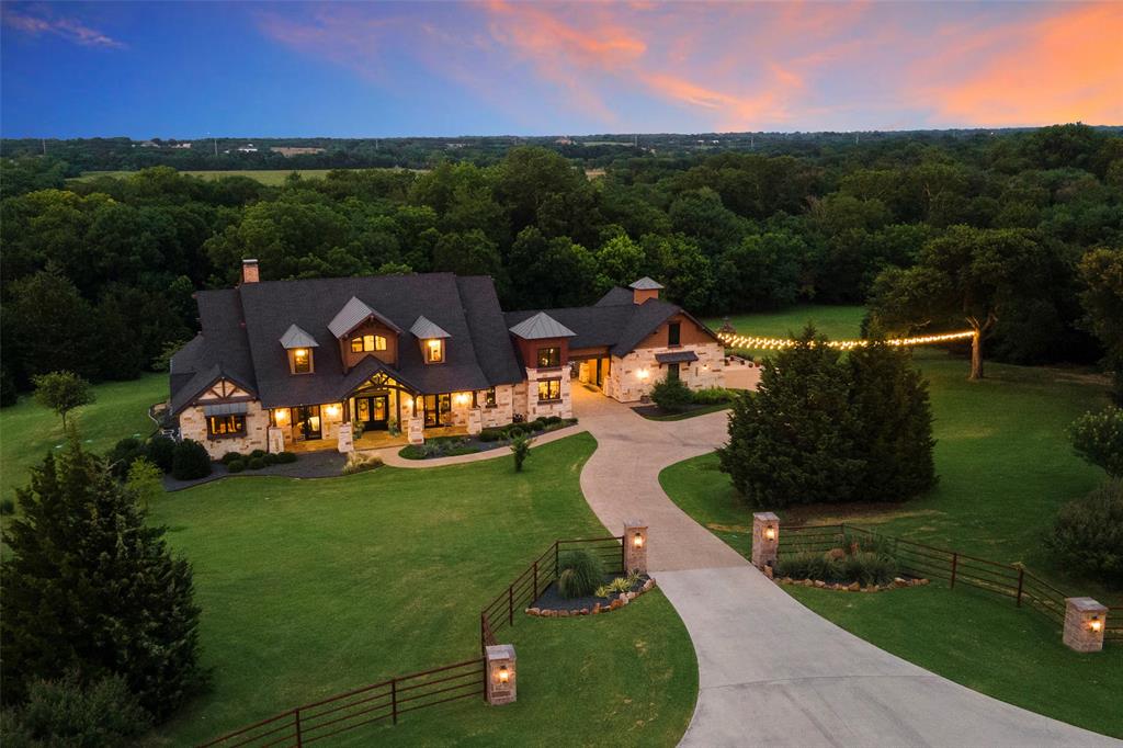 an aerial view of a house with a garden