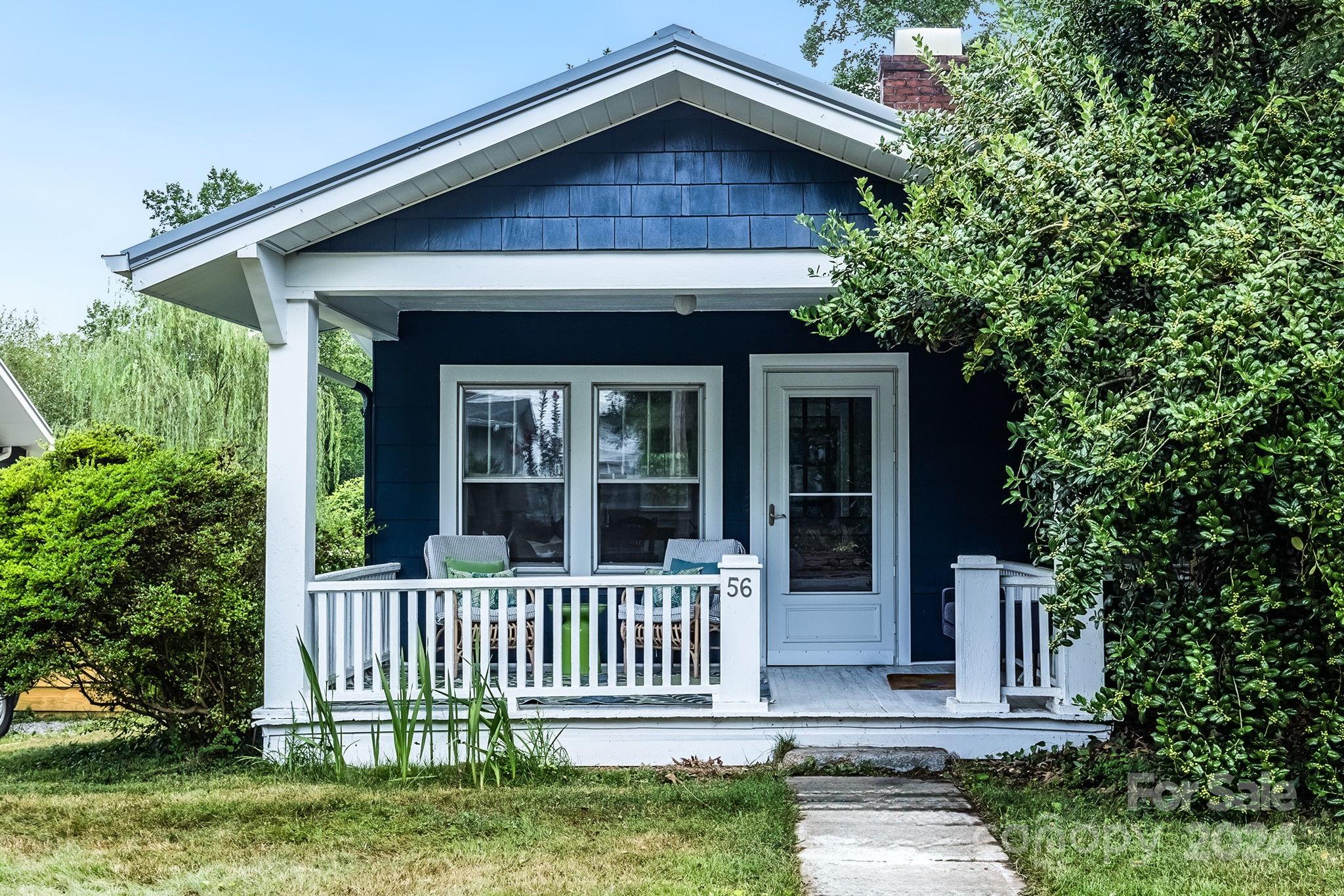 front view of a house with a small yard