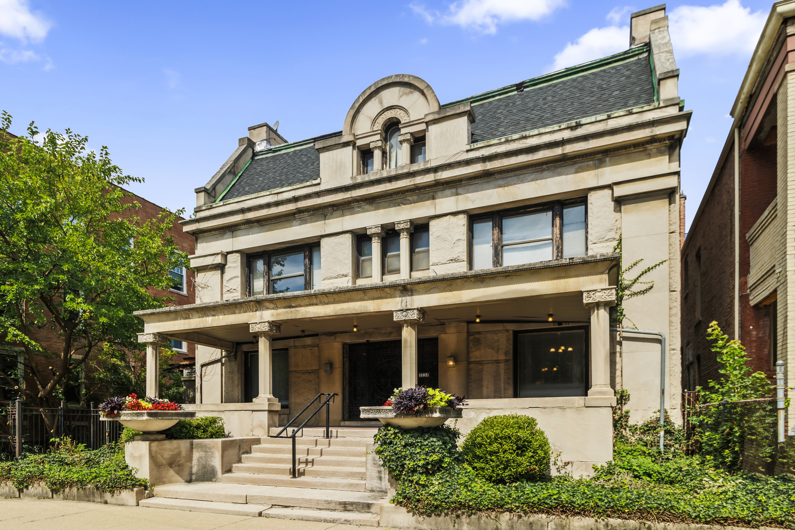 a front view of a house with garden