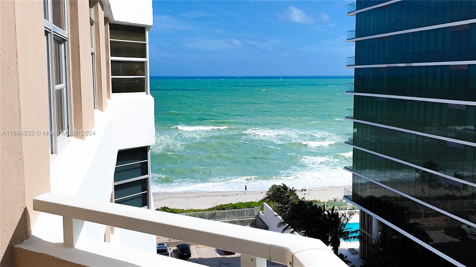 a view of a balcony with an outdoor space