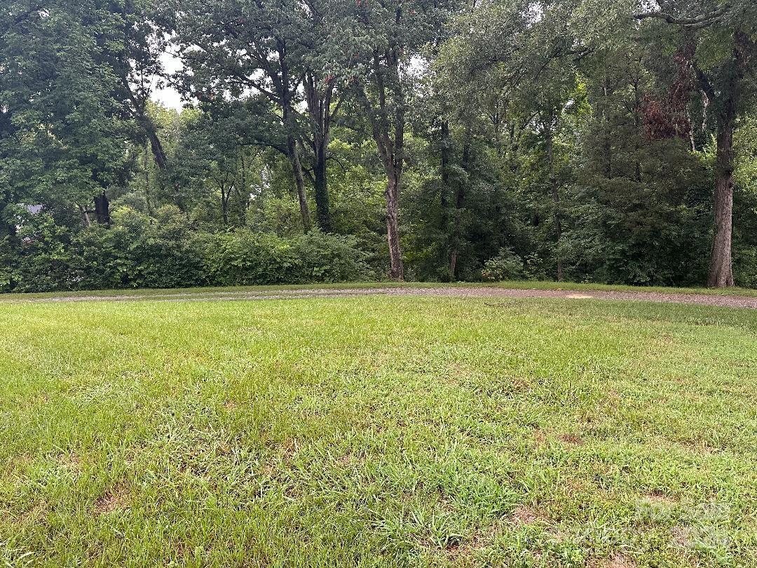 a view of a field with an outdoor space