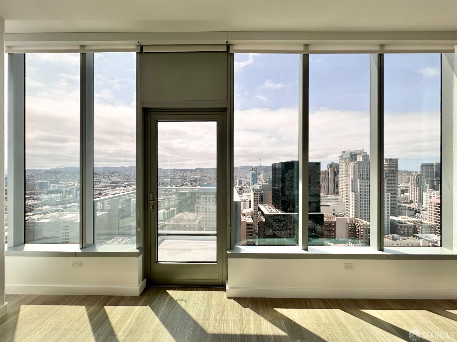 a view of a large window with a view of an outdoor space