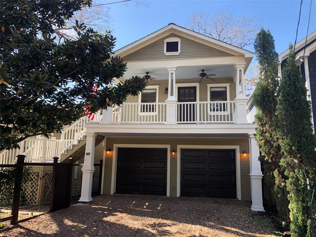 a front view of a house with a garage