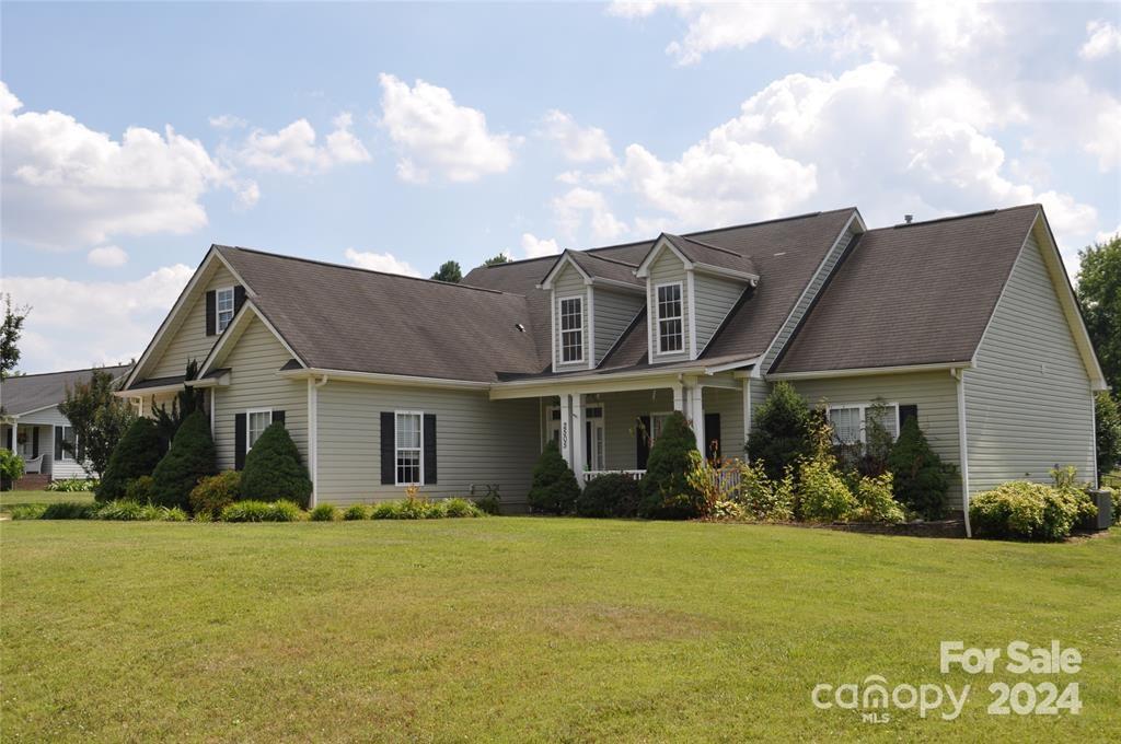 a front view of house with an outdoor seating