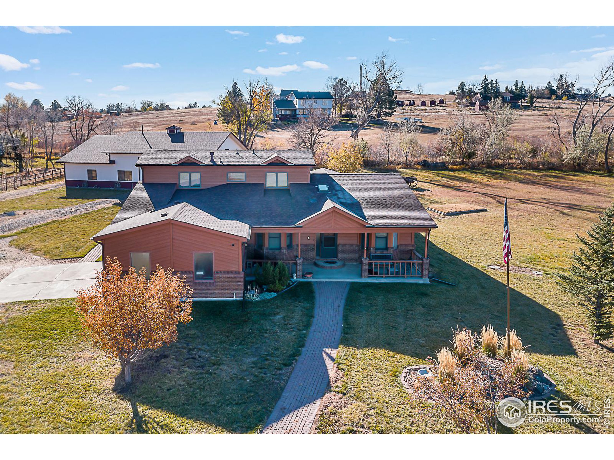 a aerial view of a house with lake view